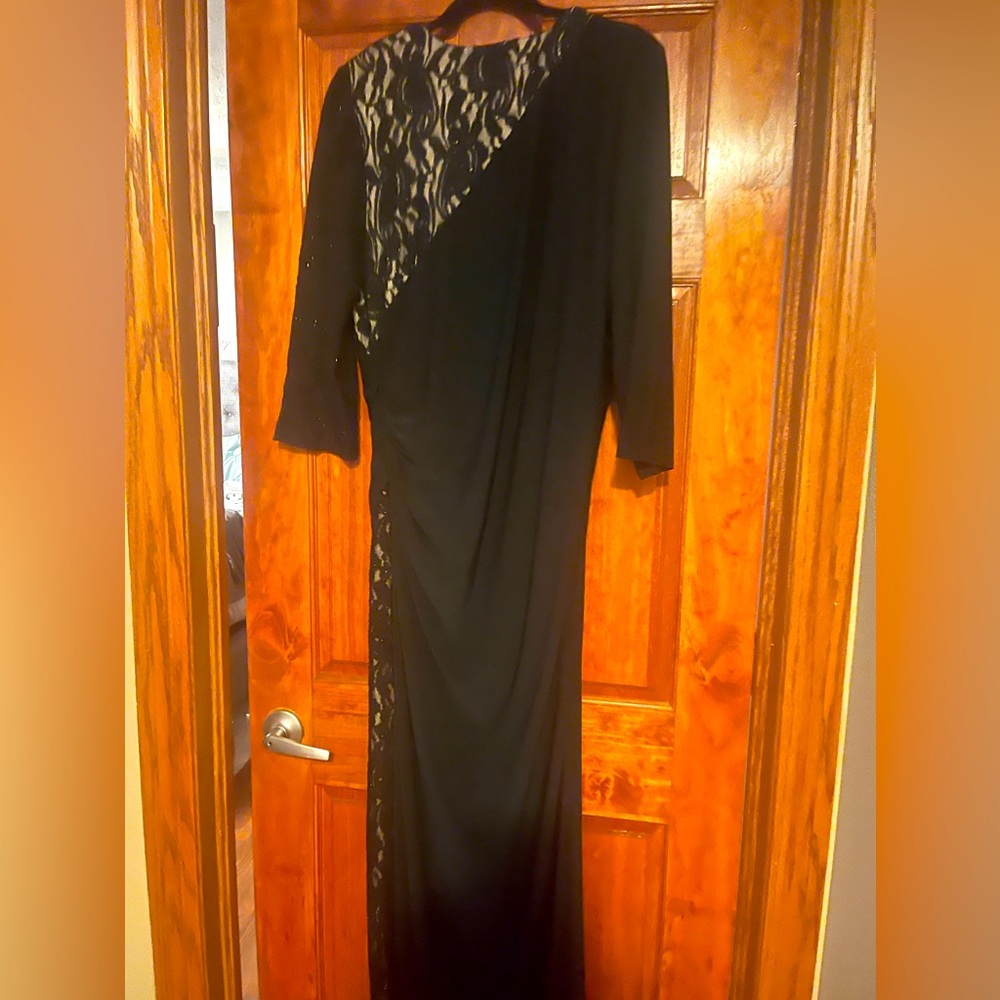 Black evening gown with lace overlay.